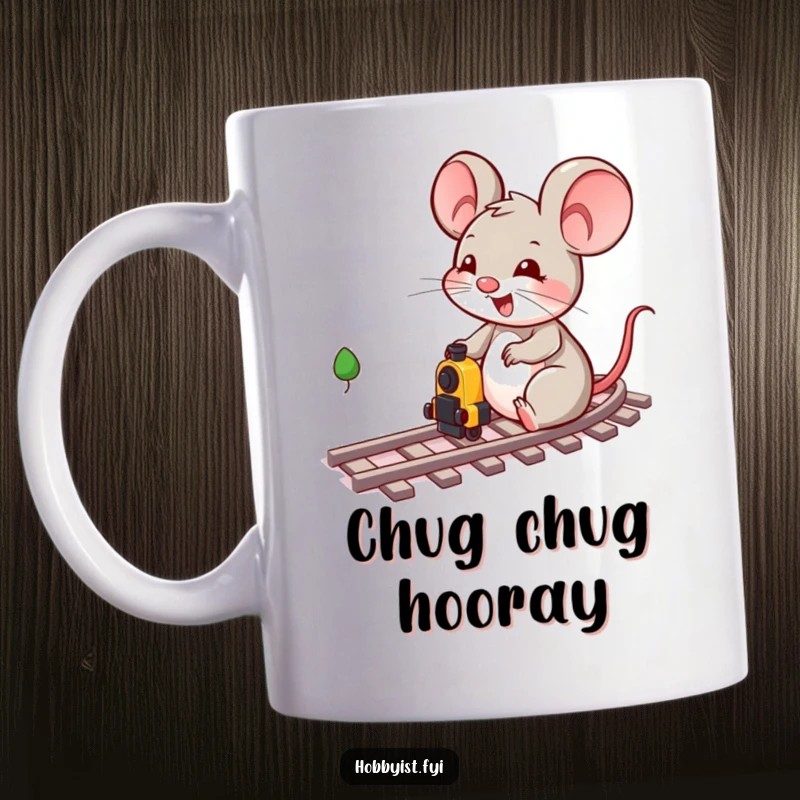 Funny, cheerful mouse character enthusiastically playing with miniature train tracks and tiny trains on this delightful mug.