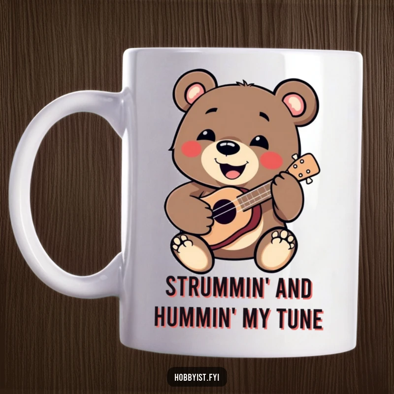 Funny Bear Mug: A smiling bear joyfully plays a tiny ukulele, showcasing musical talent and a fun personality, perfect for gifting.