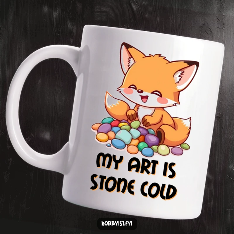 Funny Fox Mug: A little fox excitedly arranges colorful pebbles into a mosaic, showcasing artistic focus and playful creation, a great funny gift.