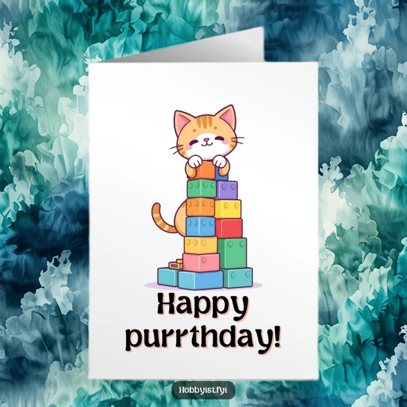 Funny Free Printable Birthday Card: A playful cat carefully stacks colorful building blocks to create a very tall tower.