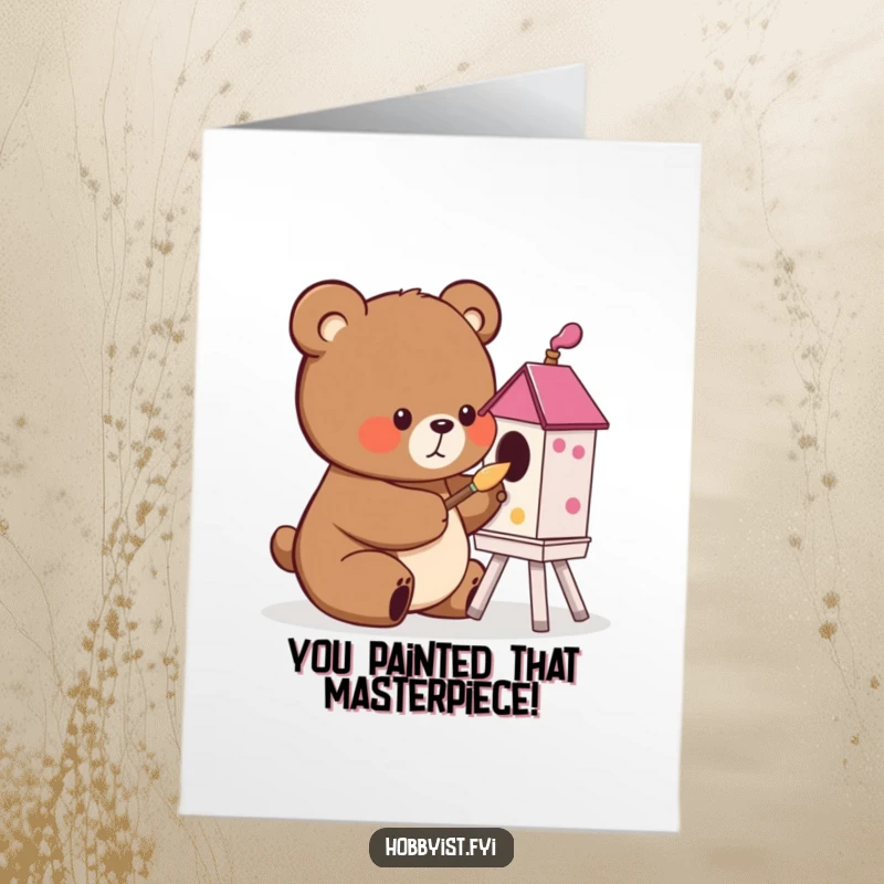 Funny free printable congratulations card featuring a cute bear character happily painting a colorful birdhouse with a tiny, meticulous brush.