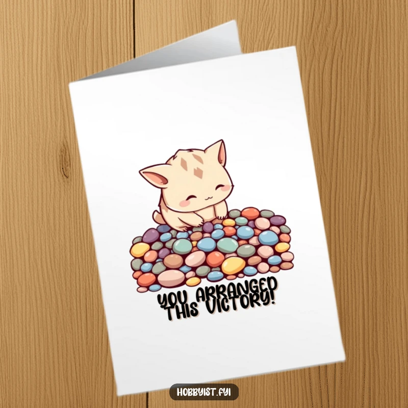 Funny Free Printable Congratulations Card of a creature arranging pebbles into a pattern, celebrating achievement with precise focus.