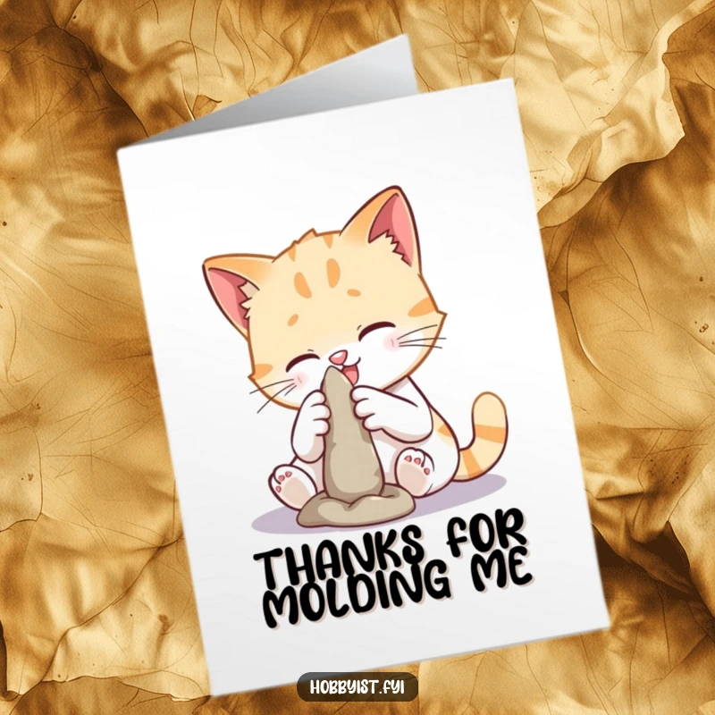 Funny Free Printable Thank You Card featuring a playful cat attempting to sculpt a tiny figure, showing thanks with artistic flair.