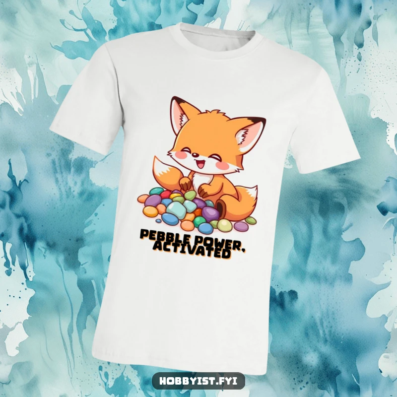 Funny Fox T-Shirt: A little fox excitedly arranges colorful pebbles into a mosaic, demonstrating focus and artistic flair, a wonderful funny gift.