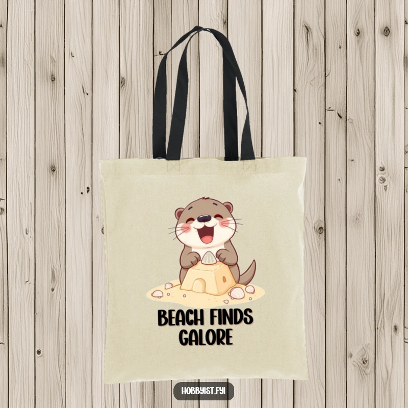 Funny Tote Bag featuring an excited otter building a sandcastle with tiny shells, perfect for carrying beach essentials with a playful touch.